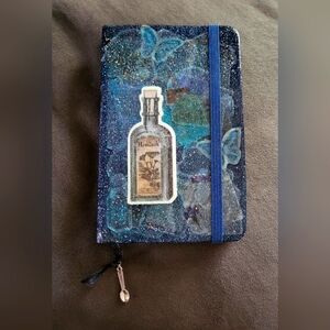 Glow-In-the-Dark Hemlock Dream Journal with Spoon Charm on Bookmark